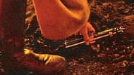Obi-Wan picking up Anakin's lightsaber (Image via Disney/Lucasfilm)